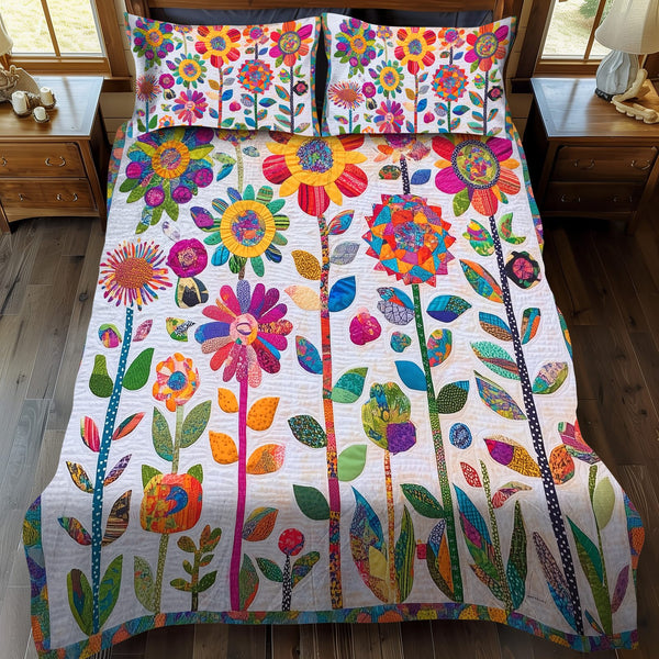 Lively Flowers quilted 3-piece bedding set on a made bed with two matching pillow shams