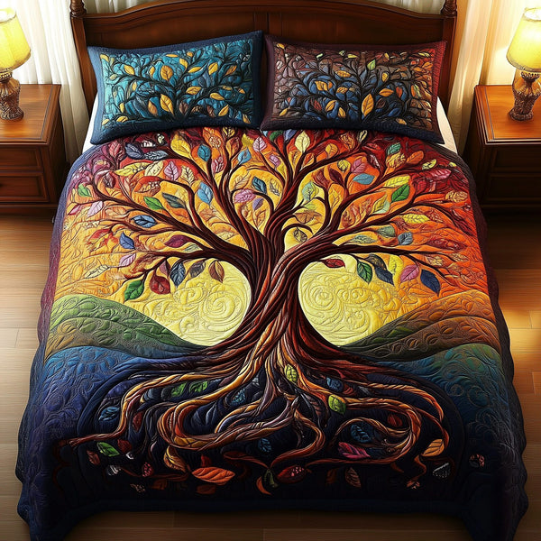 Living Essence Coverlet quilted 3-piece bedding set on a made bed with two matching pillow shams