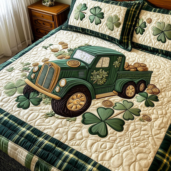 Loads Of Luck quilted 3-piece bedding set on a made bed with two matching pillow shams