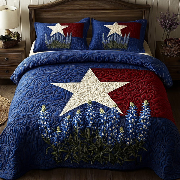 Lone Star Blossoms quilted 3-piece bedding set on a made bed with two matching pillow shams