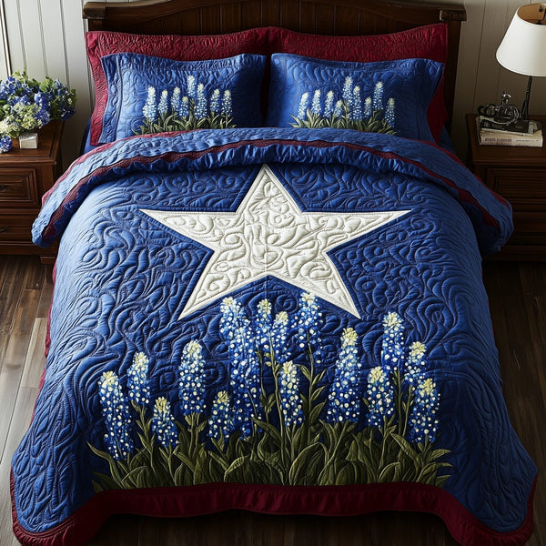Lone Star Blossoms quilted 3-piece bedding set on a made bed with two matching pillow shams