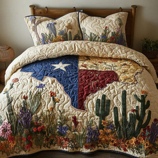 Lone Star Glory quilted 3-piece bedding set on a made bed with two matching pillow shams