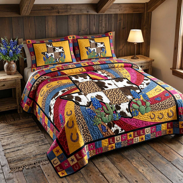 Lone Star Legacy quilted 3-piece bedding set on a made bed with two matching pillow shams