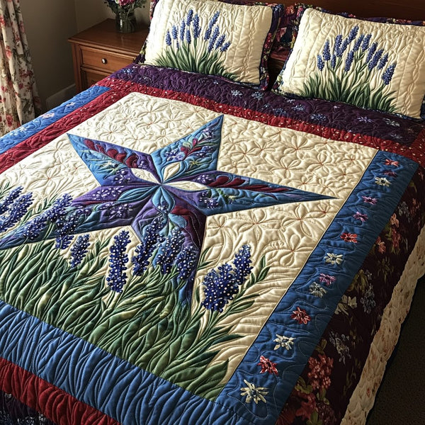 Lone Star Spirit quilted 3-piece bedding set on a made bed with two matching pillow shams