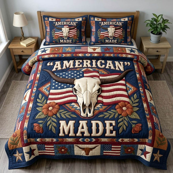 Longhorn Skull quilted 3-piece bedding set on a made bed against a dark styled interior
