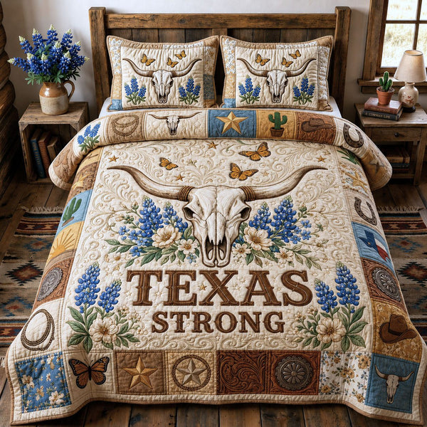 Longhorn Skull quilted 3-piece bedding set on a made bed against a dark styled interior