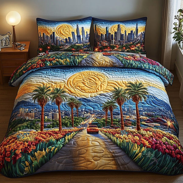 Los Angeles Coast quilted 3-piece bedding set on a made bed in a softly lit bedroom