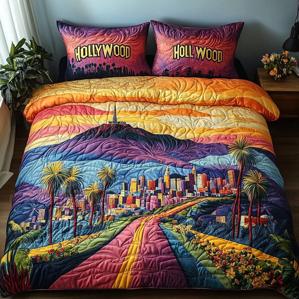 Los Angeles Vibes quilted 3-piece bedding set on a made bed in a softly lit bedroom