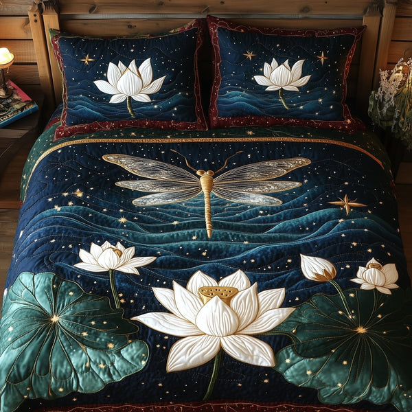 Lotus Dragonfly quilted 3-piece bedding set on a made bed with two matching pillow shams
