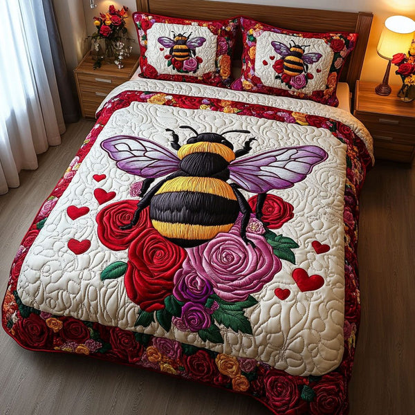 Love in the Wild quilted 3-piece bedding set on a made bed with two matching pillow shams