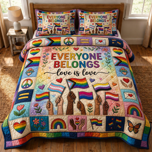 Love Is Love quilted 3-piece bedding set on a made bed with two matching pillow shams
