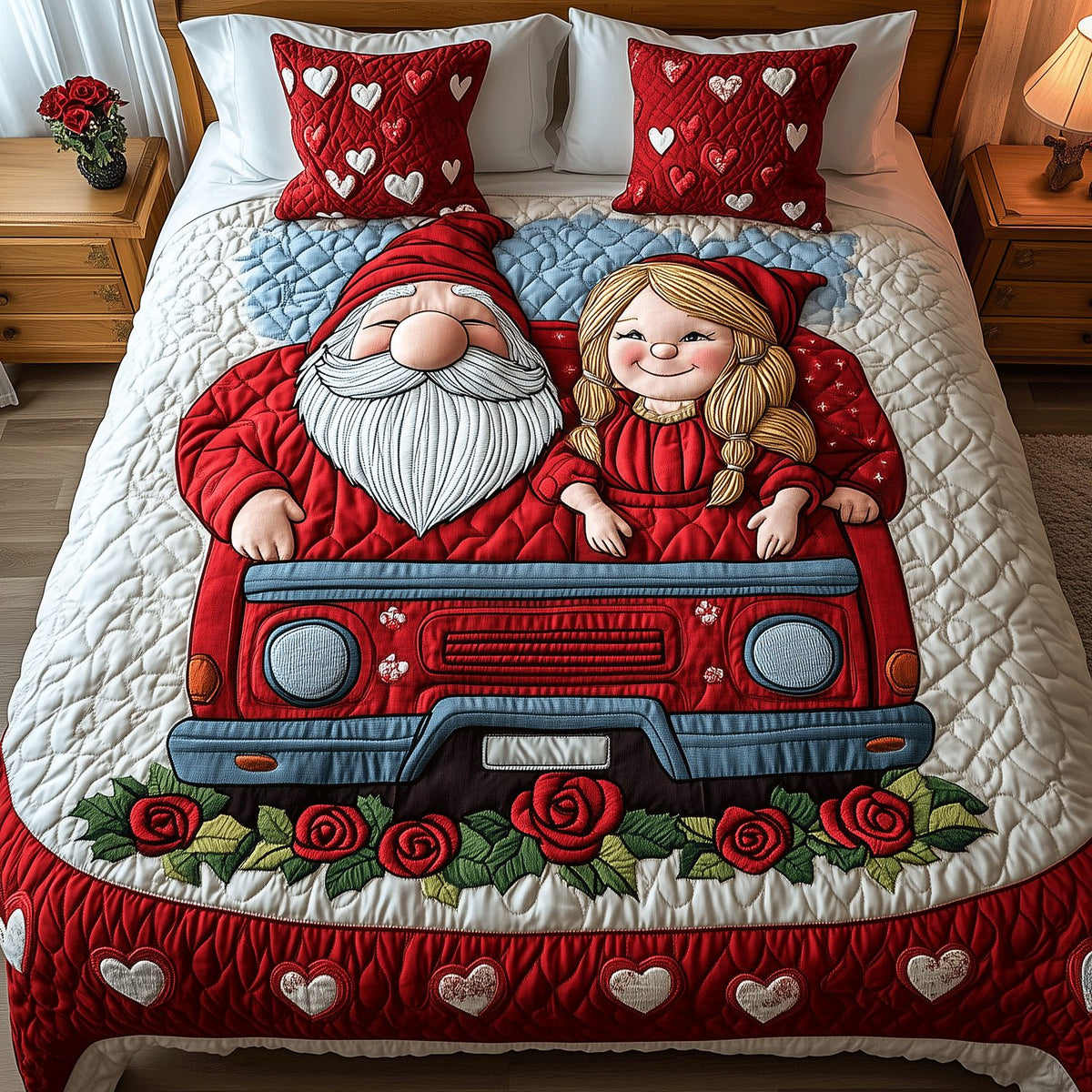 Love on Wheels quilted 3-piece bedding set on a made bed with two matching pillow shams