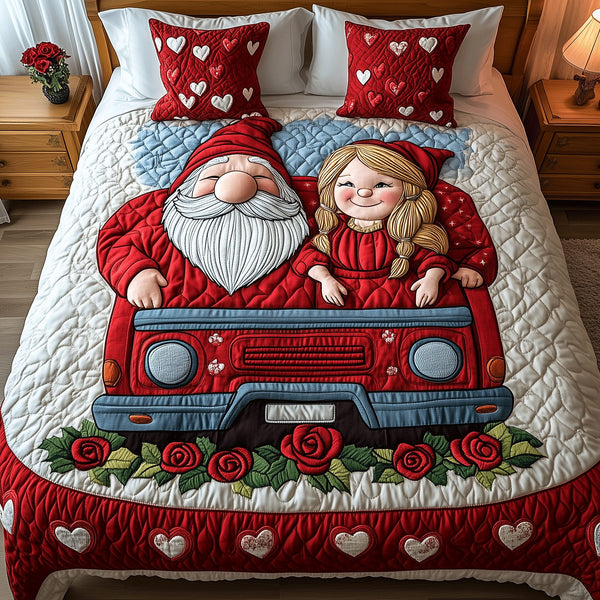 Love on Wheels quilted 3-piece bedding set on a made bed with two matching pillow shams