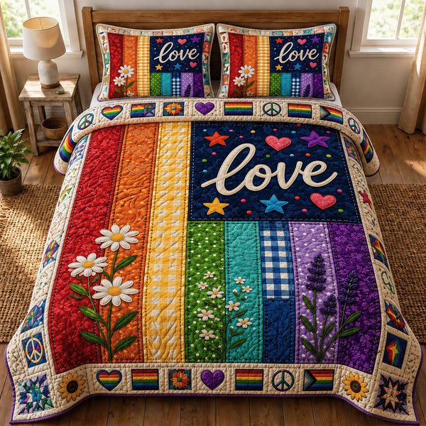 Love Pride quilted 3-piece bedding set on a made bed with two matching pillow shams