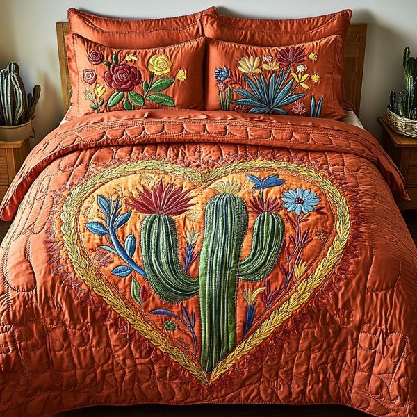 Love Succulent quilted 3-piece bedding set on a made bed with two matching pillow shams