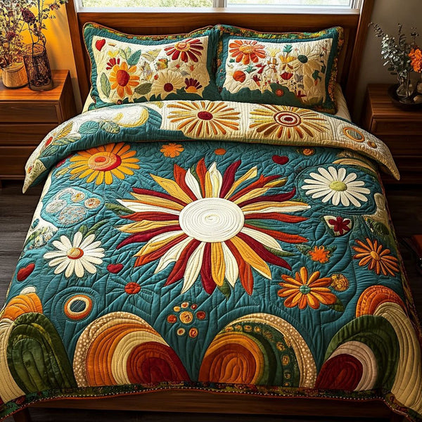 Love Sunburst quilted 3-piece bedding set on a made bed with two matching pillow shams