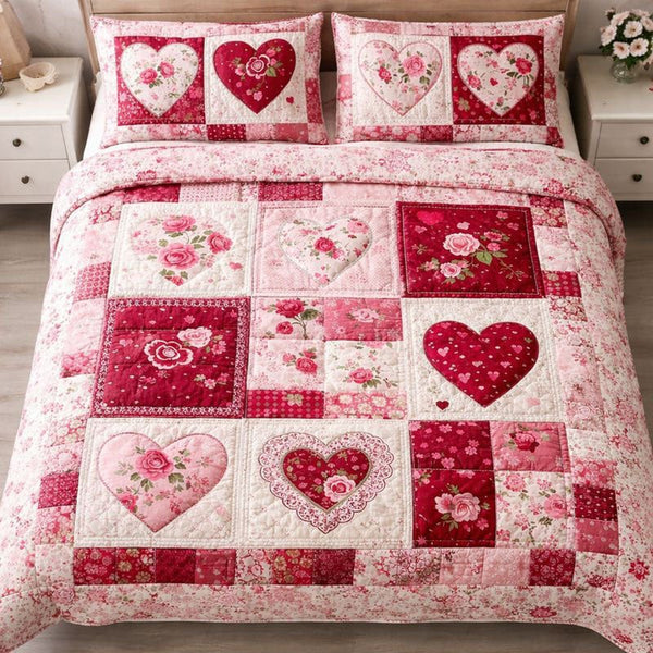 Loving Hearts quilted 3-piece bedding set on a made bed with two matching pillow shams