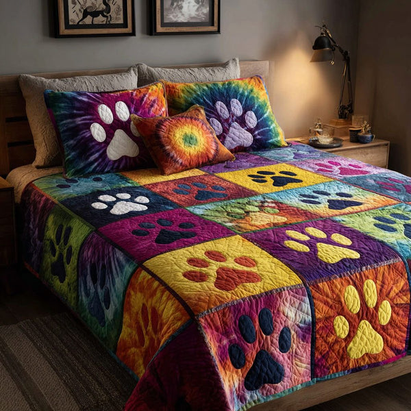 Loving Paws quilted 3-piece bedding set on a made bed with two matching pillow shams