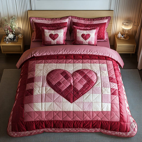 Loving Stitches quilted 3-piece bedding set on a made bed with two matching pillow shams