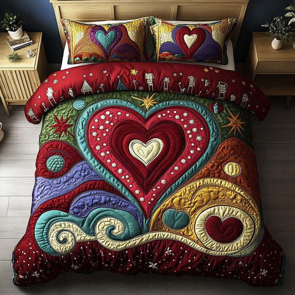 Loving Whispers quilted 3-piece bedding set on a made bed with two matching pillow shams
