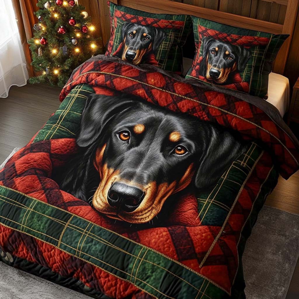 Loyal Doberman quilted 3-piece bedding set on a made bed with two matching pillow shams