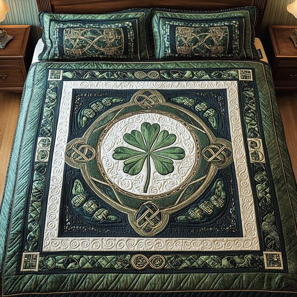 Lucky Clover Haven quilted 3-piece bedding set on a made bed with two matching pillow shams