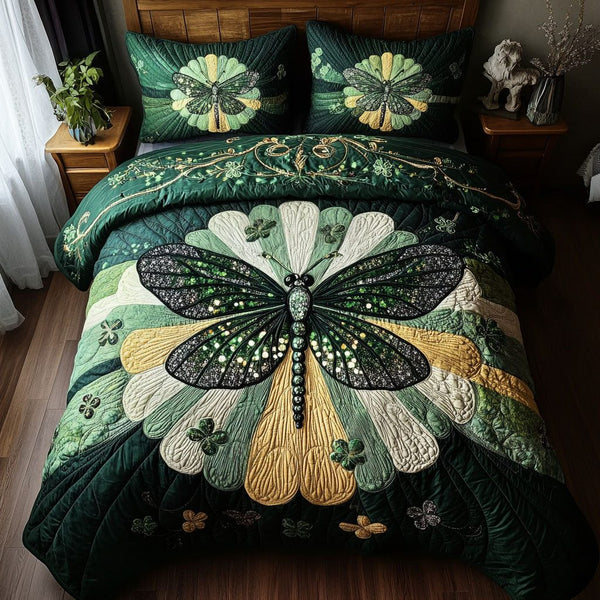 Lucky Dragonfly quilted 3-piece bedding set on a made bed with two matching pillow shams