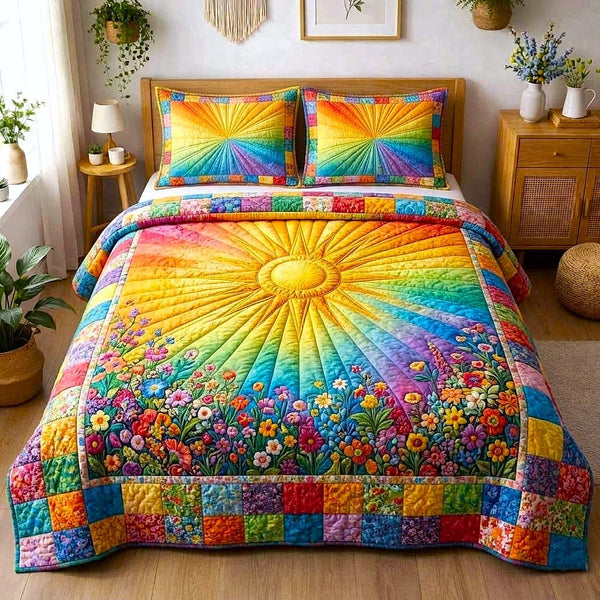 Luminous Bloom quilted 3-piece bedding set on a made bed with two matching pillow shams