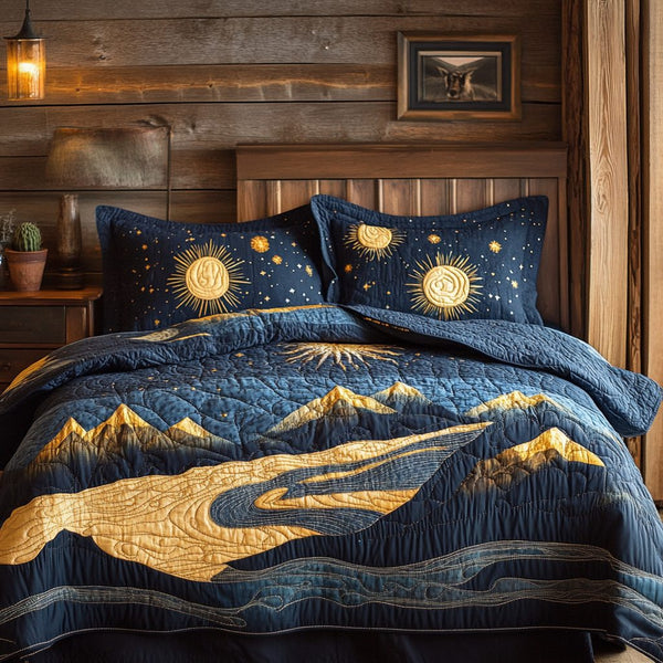 Lunar Peaks quilted 3-piece bedding set on a made bed with two matching pillow shams