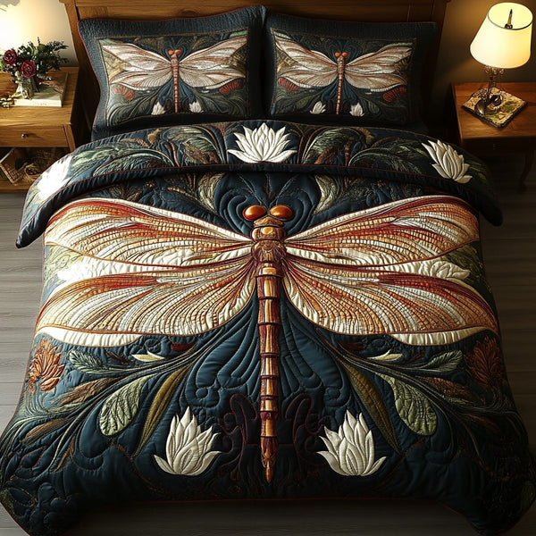 Lunar Wings quilted 3-piece bedding set on a made bed with two matching pillow shams