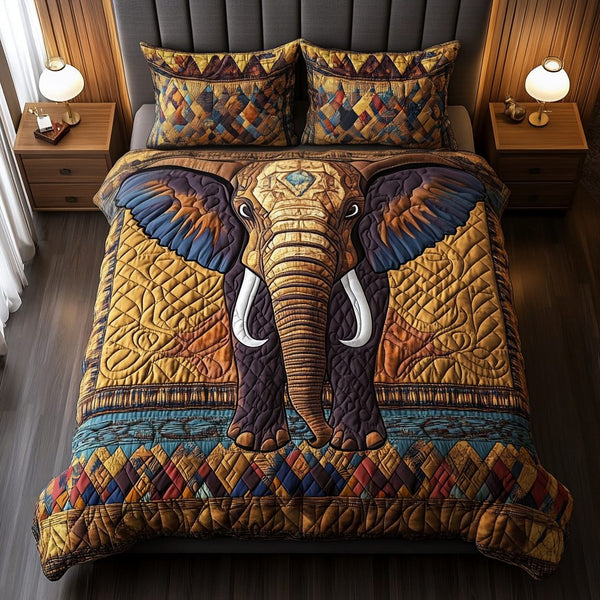Luxurious Glow quilted 3-piece bedding set on a made bed with two matching pillow shams