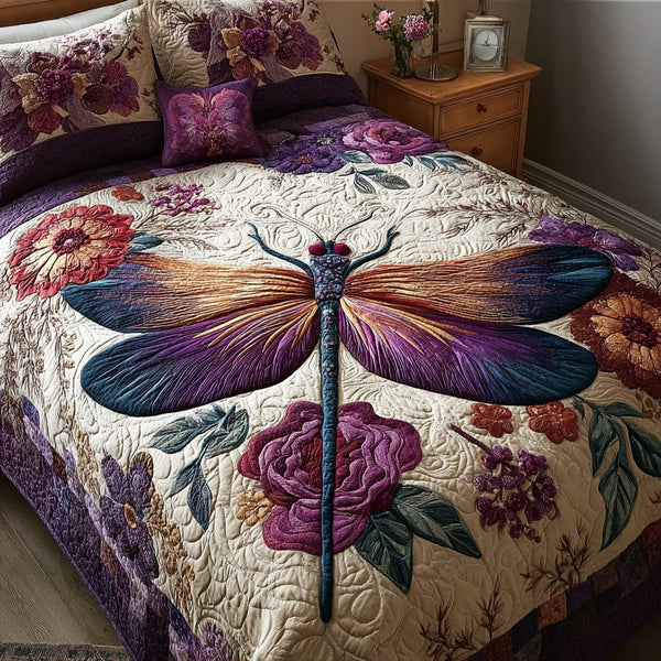 Magic Dragonfly quilted 3-piece bedding set on a made bed with two matching pillow shams