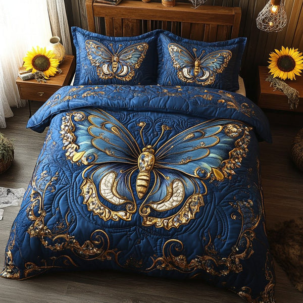 Magical Wings quilted 3-piece bedding set on a made bed with two matching pillow shams