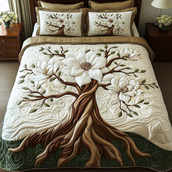 Magnolia Charm quilted 3-piece bedding set on a made bed with two matching pillow shams