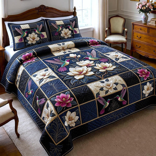 Magnolia Patchwork quilted 3-piece bedding set on a made bed in a farmhouse bedroom
