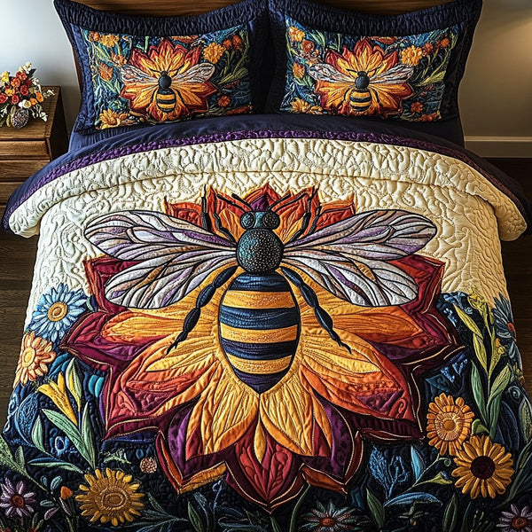 Majestic Bee Blossom quilted 3-piece bedding set on a made bed with two matching pillow shams