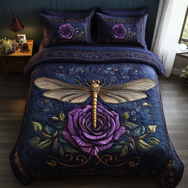 Majestic Dragonfly quilted 3-piece bedding set on a made bed with two matching pillow shams