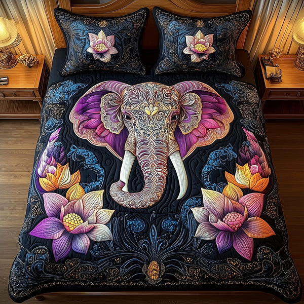 Majestic Elephant Bliss quilted 3-piece bedding set on a made bed with two matching pillow shams