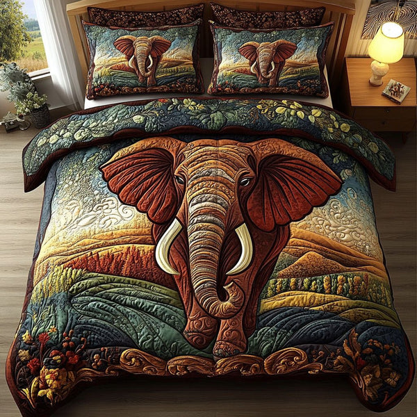 Majestic Elephant Dream quilted 3-piece bedding set on a made bed with two matching pillow shams
