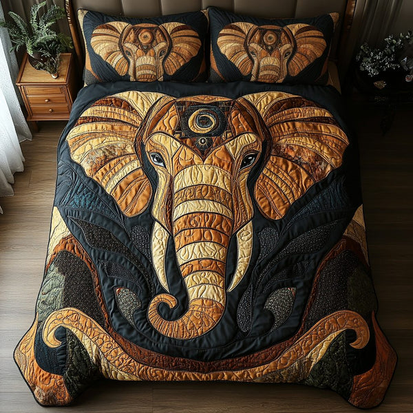 Majestic Elephant quilted 3-piece bedding set on a made bed with two matching pillow shams