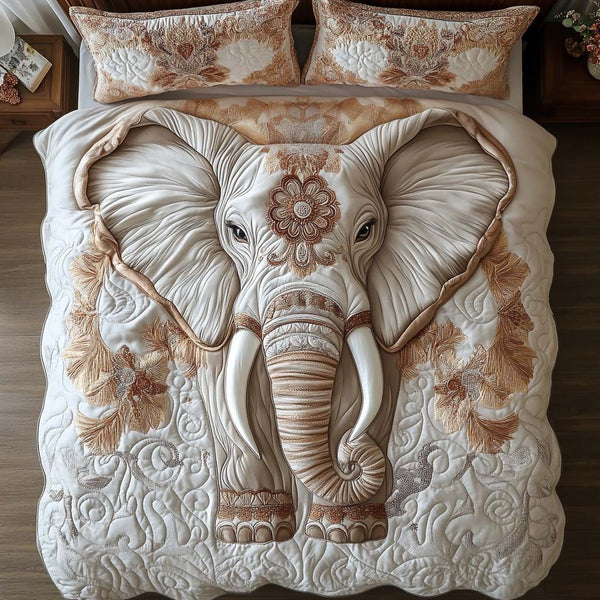 Majestic Elephant quilted 3-piece bedding set on a made bed with two matching pillow shams