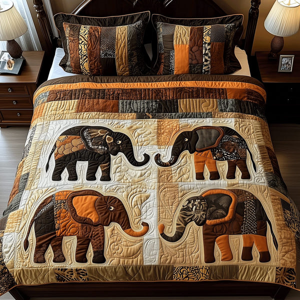 Majestic Elephant quilted 3-piece bedding set on a made bed with two matching pillow shams