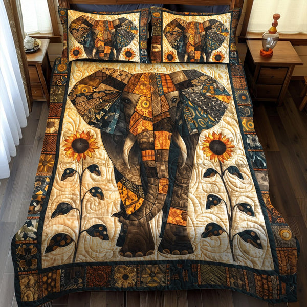 Majestic Elephant quilted 3-piece bedding set on a made bed with two matching pillow shams
