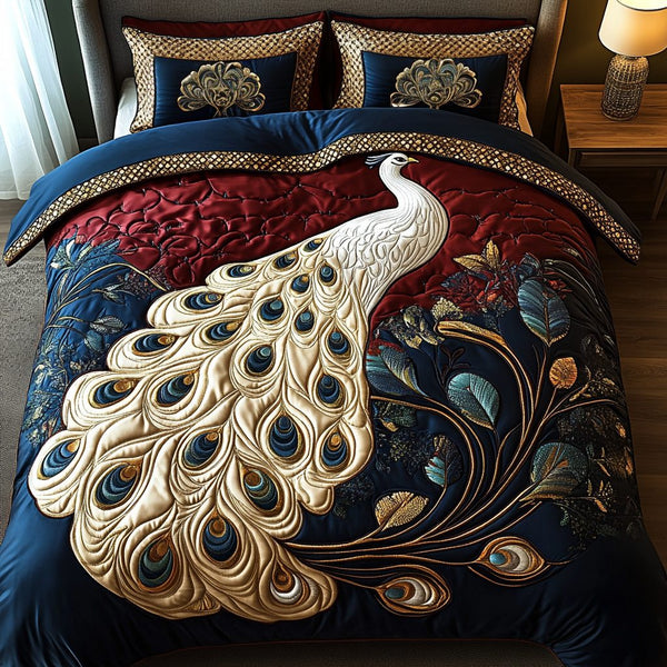 Majestic Feathers quilted 3-piece bedding set on a made bed with two matching pillow shams