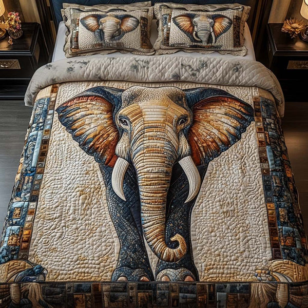 Majestic Gaze quilted 3-piece bedding set on a made bed with two matching pillow shams