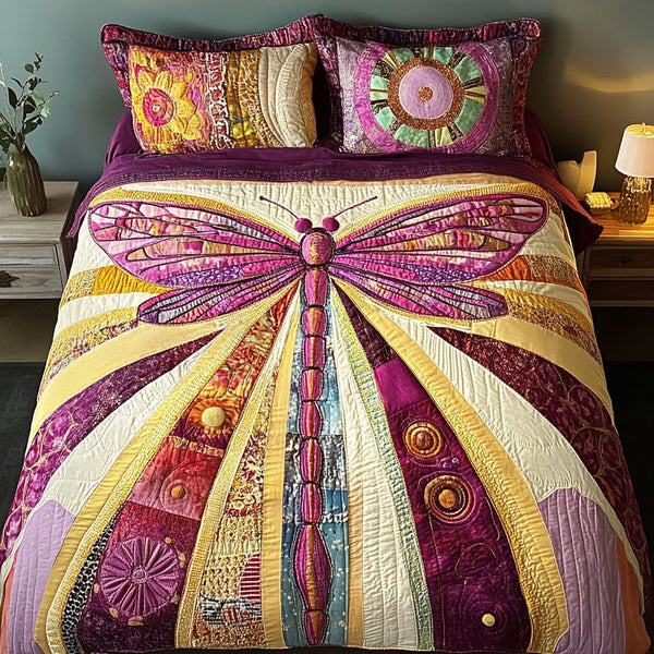Majestic Glide quilted 3-piece bedding set on a made bed with two matching pillow shams