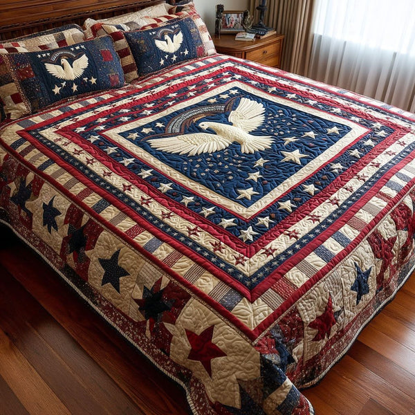 Majestic Glory quilted 3-piece bedding set on a made bed with two matching pillow shams
