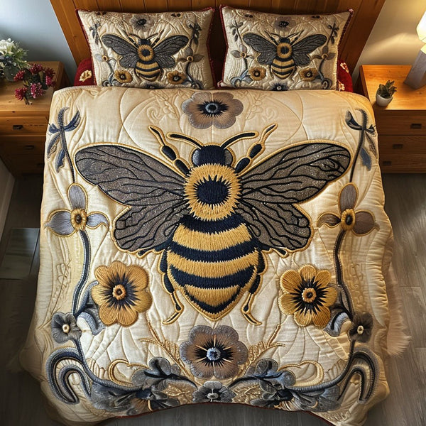 Majestic Hive quilted 3-piece bedding set on a made bed with two matching pillow shams