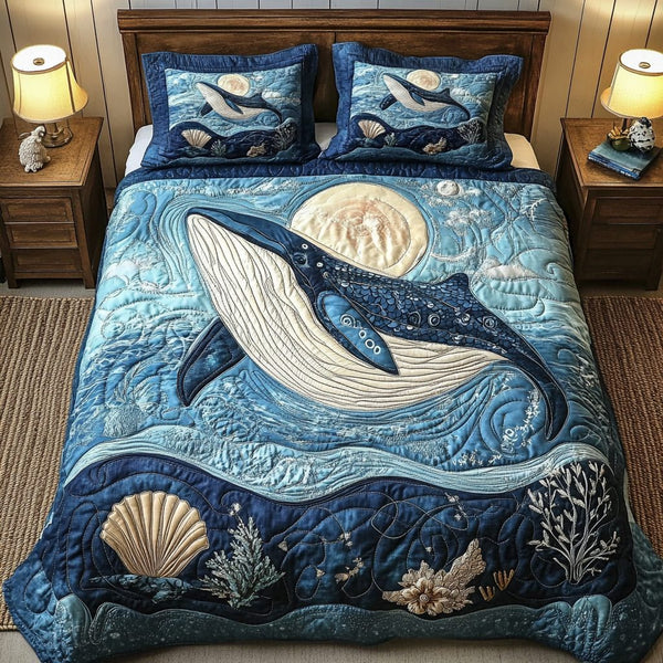 Majestic Humpback Escape quilted 3-piece bedding set on a made bed with two matching pillow shams