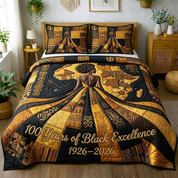 Majestic Melanin quilted 3-piece bedding set on a made bed with two matching pillow shams